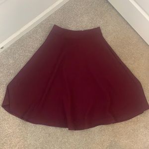 Unique Vintage size medium midi Circle/skater wine colored skirt.